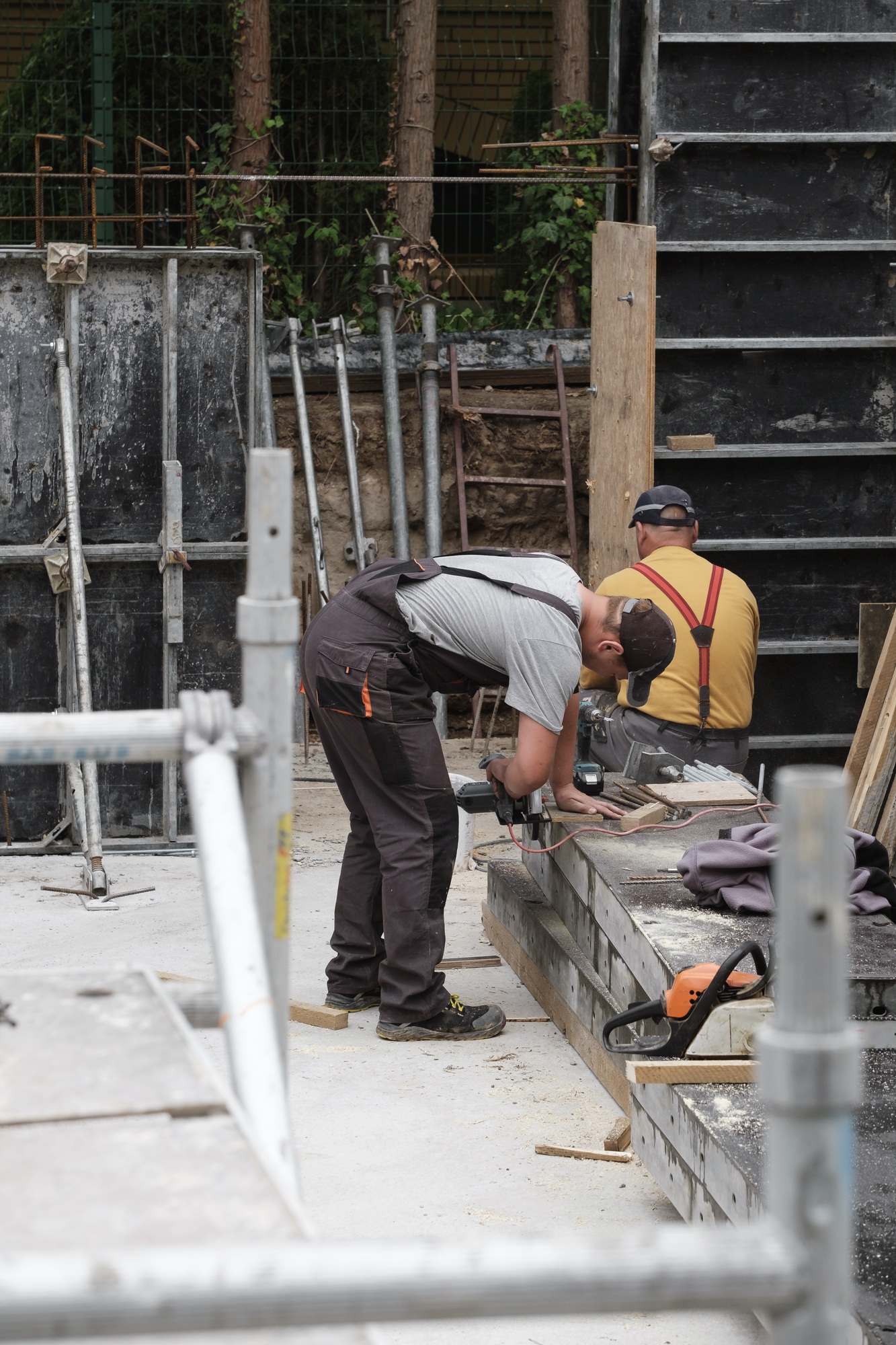 man working at construction site building house